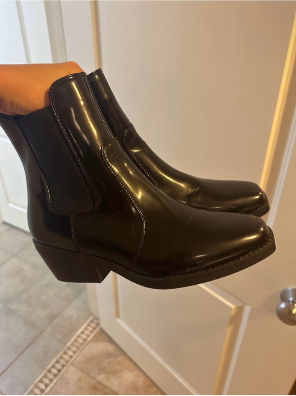 Black vinyl boots